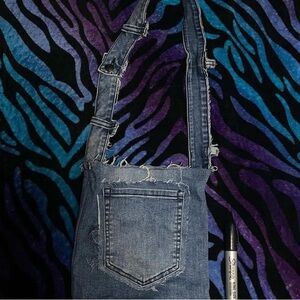 Unique upcycled denim bag with a touch of grunge charm